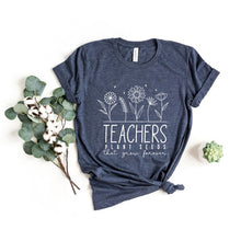 Load image into Gallery viewer, Teachers Plant Seeds That Grow Forever Graphic Tee
